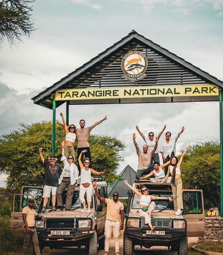 Jiranair guide with guests in the Tanzanian savanna